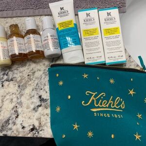 Kiehl's Teal Pouch with Skincare products